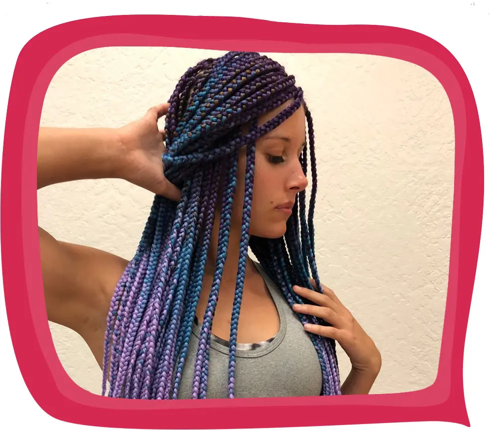 A woman with purple and blue hair putting on her hands.